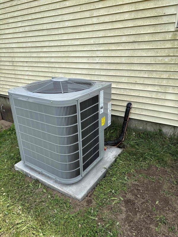Completed full HVAC system installation including new furnace and air conditioning unit in residential property. Installed gas furnace in basement utility area with proper ductwork connections to existing distribution system, secured unit to manufacturer specifications, and verified all supply and return air pathways. Mounted new condensing unit on exterior concrete pad with proper clearances, ran refrigerant lines and electrical conduit through exterior wall penetration, established sealed connections between indoor and outdoor components, and completed all electrical terminations per code requirements.
