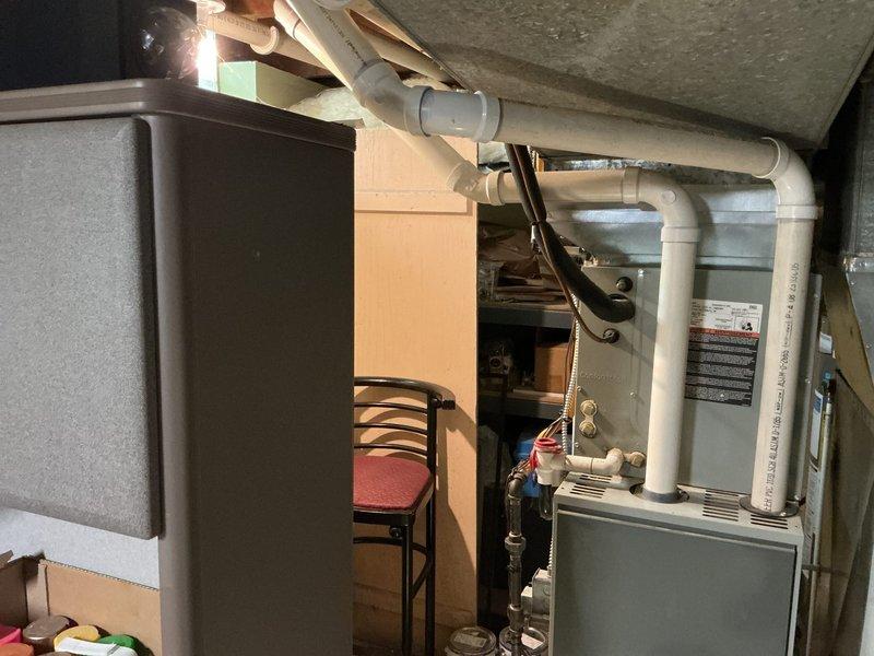 Completed rental inspection on 11-year-old Trane furnace and 7-year-old Rheem Professional water heater. Both units were visually inspected, photographed, and found to be in operational condition with no immediate safety concerns or required repairs identified at time of inspection.