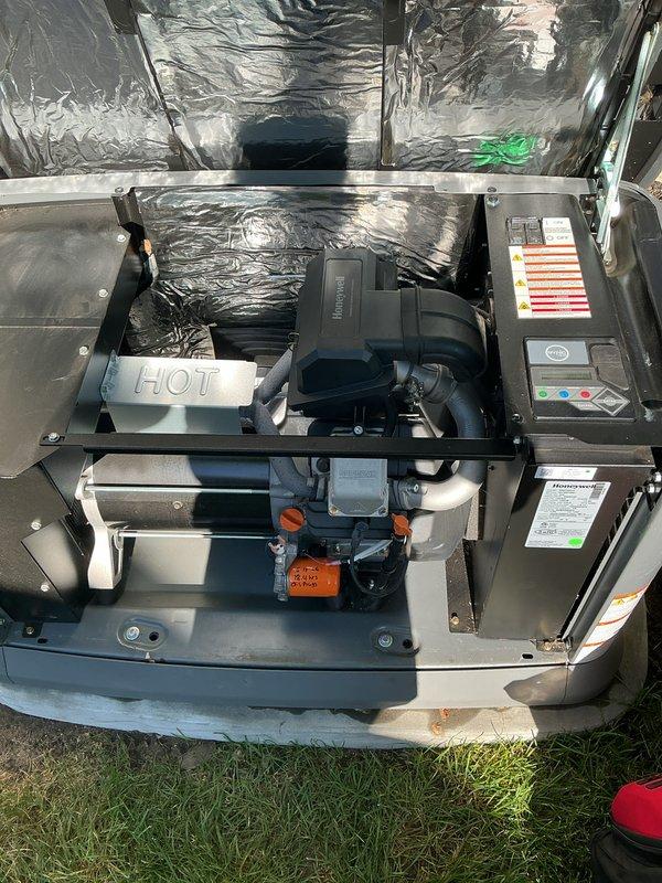 Completed scheduled 2-year complementary tune-up on Generac standby generator unit with no issues found. Performed comprehensive inspection of all major components including gas regulator assembly, valve connections, control panel, and motor assembly. All systems tested and verified operational, with proper connections secured and equipment confirmed in good working condition.