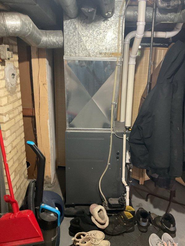 Completed estimate for adding air conditioning system to existing home with furnace already in place. Assessed electrical panel capacity and available breaker spaces to support new AC unit installation, photographed current mechanical room layout including furnace location and existing ductwork configuration. Evaluated installation requirements for condensing unit placement, refrigerant line routing, and integration with current heating system to provide comprehensive cooling solution.