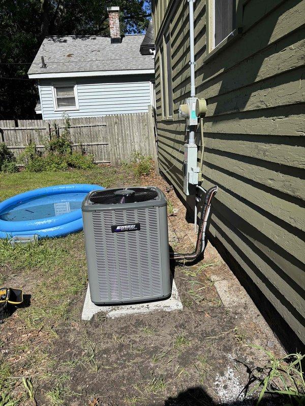 Completed full add-on air conditioning system installation to existing forced-air heating system. Installed new outdoor condensing unit on concrete pad with proper clearances from structure, connected refrigerant lines and electrical service. Added evaporator coil to existing furnace plenum in basement mechanical room, integrated condensate drainage via PVC piping, and established proper venting configuration. Tested system operation, verified proper refrigerant charge and airflow, confirmed all electrical connections meet code requirements.