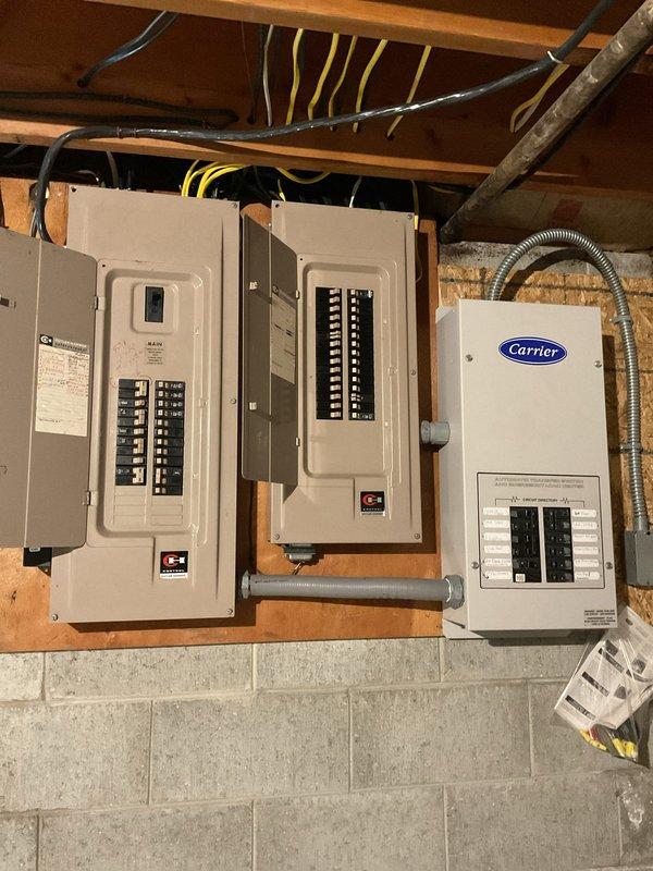 Conducted electrical estimate for Tesla wall charger relocation from existing residence to new property. Assessed current installation including electrical panel capacity, conduit routing through attic space, and existing circuit configuration to determine scope of work for disconnection, removal, and future reinstallation at new location.