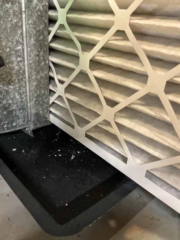 Completed annual cooling maintenance on 7-year-old Trane system. Performed comprehensive tune-up including inspection of all mechanical and electrical components, refrigerant lines, condensate drainage system, and ductwork connections. Documented equipment condition with photos showing air filter status and HVAC components in mechanical space.