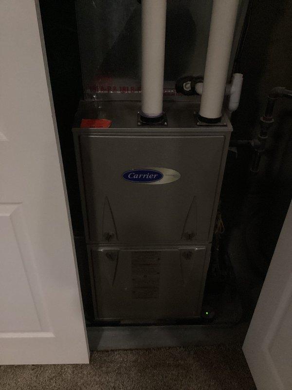 Completed comprehensive ASTU-AC Super Tune-up on Carrier split system for recent homeowner requesting preventive maintenance inspection. Performed complete system evaluation of indoor furnace unit and outdoor condensing unit, verified proper operation of all components, inspected refrigerant line connections, and documented equipment condition with photographs. All systems found operating within normal parameters with no immediate service needs identified.