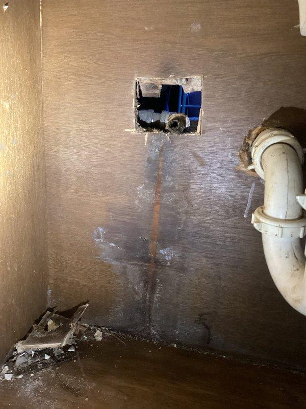 Responded to emergency service call for small leak at upstairs bathroom sink hot water supply connector. Upon arrival, found hot water shut off to fixture. Inspected under-sink plumbing and identified compromised hot water supply line connection causing active leak. Repaired faulty connector, restored hot water supply to sink, tested system for proper operation and verified no additional leaks present.