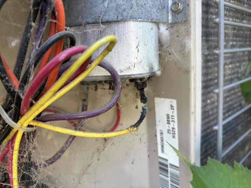 Responded to no heating or cooling complaint on 23-year-old Lennox system with 2-year-old thermostat. Upon inspection, discovered failed run capacitor on outdoor condensing unit preventing compressor operation. Capacitor exhibited severe corrosion, oxidation, and deteriorated wire connections with visible mineral deposits at terminals. Removed defective GE capacitor and replaced with new dual-run capacitor rated at 370 VAC. Cleaned terminal connections, secured all wiring, and verified proper voltage at contactor. Cycled system through heating and cooling modes to confirm proper operation. Thermostat now successfully communicating with HVAC equipment and system restored to full functionality.