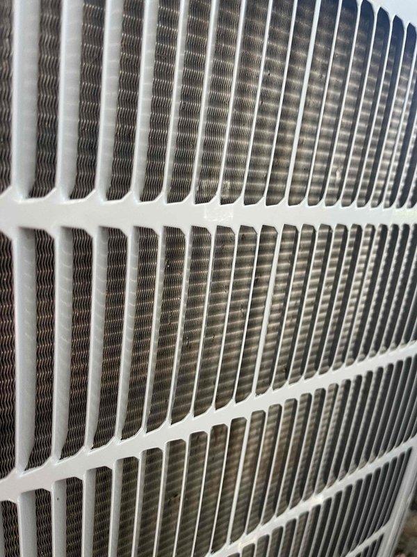Responded to no cooling call on six-year-old Carrier unit with complete system failure affecting entire home. Upon inspection, discovered outdoor condenser coil heavily clogged with dense accumulation of dirt, dust, lint, and fibrous debris significantly restricting airflow and preventing proper heat transfer. Performed thorough coil cleaning to remove blockage and restore system operation. Unit tested and confirmed cooling restored to normal operating parameters.