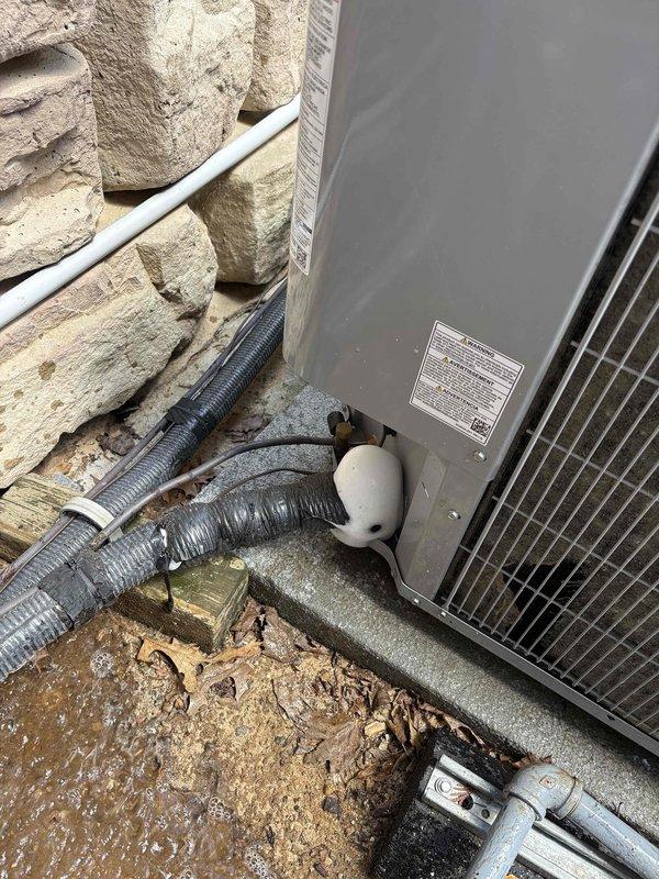 Responded to air conditioning system not cooling to set temperature. Inspected indoor air handler unit and outdoor condensing unit. Evaluated system components including ductwork connections, refrigerant lines, and electrical conduits. Documented equipment condition with photos showing indoor mechanical components and outdoor unit installation. System is under 2-year parts warranty coverage extending through June 2028.