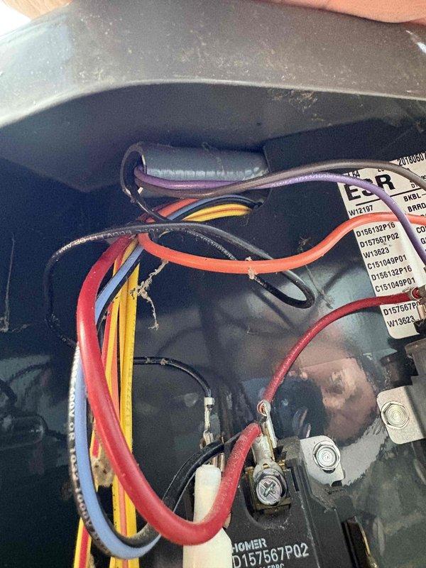 # AC Noise Complaint - 9-Year-Old Unit

Responded to customer complaint regarding increased operational noise from outdoor condensing unit. Upon arrival, conducted visual and auditory inspection of the 9-year-old air conditioning system. Examined outdoor unit for loose components, debris accumulation, and mechanical wear. Inspected internal electrical connections, contactor assembly, and wiring harness for any loose terminals or vibration-related issues. Checked fan motor mounting, blade condition, and grille assembly for potential sources of abnormal sound. Verified refrigerant line connections and mounting brackets for secure installation. Documented equipment condition with photographs of internal electrical components and exterior unit placement. Provided customer with findings and recommendations for addressing noise concern.