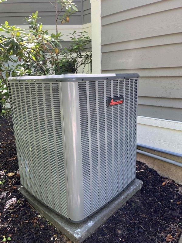 Completed annual cooling system maintenance and inspection on residential HVAC system consisting of Amana furnace with integrated cooling coil and outdoor condensing unit. Performed comprehensive tune-up including refrigerant charge verification, electrical connection inspection, condensate drain line check, and filter assessment. Inspected outdoor condenser unit positioned on concrete pad, verified proper airflow through louvers, and confirmed unit operation. Evaluated indoor mechanical room components including PVC condensate piping network, humidifier integration, and ductwork connections. All systems operating within normal parameters with no immediate service concerns identified.
