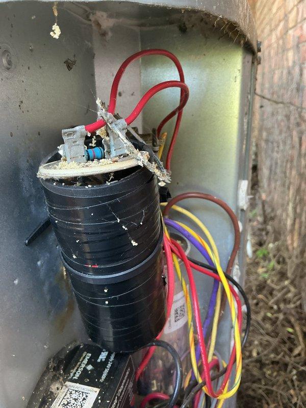 Completed annual cooling system maintenance on 11-year-old unit. Performed comprehensive inspection of electrical components including capacitor assembly, wiring connections, and control module. Cleaned accumulated debris and cobwebs from outdoor unit enclosure, verified all electrical connections were secure, and confirmed system operational status upon completion.