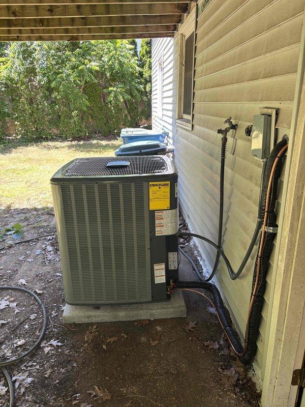 Completed full HVAC system installation including new furnace and air conditioning condenser unit. Installed outdoor AC unit on concrete pad with proper refrigerant line routing secured to exterior wall using mounting brackets, electrical disconnect box mounted per code requirements, and all connections properly sealed. System tested and verified operational upon completion.