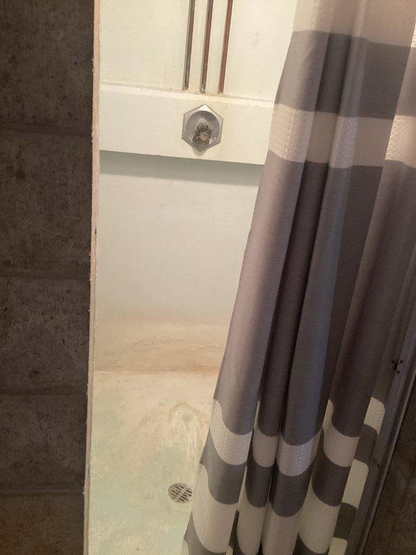Provided pricing estimate for installation of above-grade sewage lift system for septic tank application. Customer was unavailable for immediate consultation, so quote was documented for follow-up. Inspected existing plumbing infrastructure in basement utility area where lift station would be installed, noting current drainage pipe configuration and available space for equipment placement.
