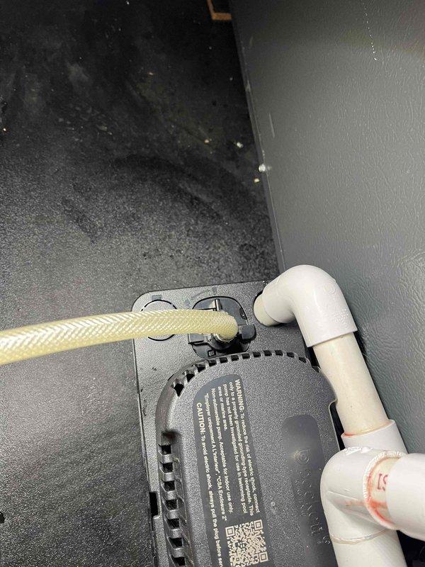Completed annual cooling maintenance on EnergiAir system. Performed comprehensive tune-up including inspection of condensate pump assembly and drainage system. Verified proper operation of condensate pump unit with associated flexible discharge line and PVC drainage piping. Confirmed all electrical connections secure and pump functioning correctly. System operating within normal parameters.