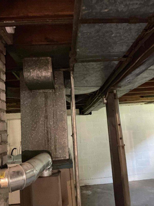 Responded to plumbing leak in basement utility area. Installed new pipe section to address leaking condition near washing machine location. Replaced damaged piping with new materials, ensuring proper connections and secure fittings. Verified system integrity and confirmed no active leaks upon completion of installation.