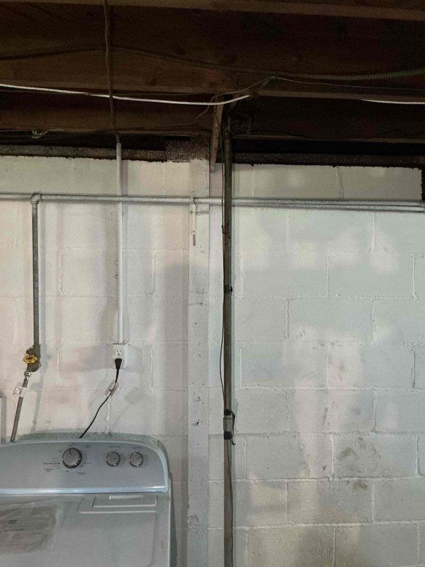 Responded to plumbing leak in basement utility area. Installed new pipe section to address leaking condition near washing machine location. Replaced damaged piping with new materials, ensuring proper connections and secure fittings. Verified system integrity and confirmed no active leaks upon completion of installation.