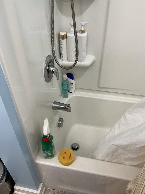 Performed jetting service on residential bathtub drain line to clear obstruction. Accessed drain system through tub drain opening and utilized high-pressure water jetting equipment to remove buildup and restore proper drainage. Verified flow restoration and left system operational with no warranty provided per quoted repair terms.
