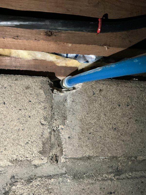 Replaced exterior hose bib that was located in crawl space area accessible through attic access point. Disconnected old faucet from copper supply line, installed new frost-free sillcock, and verified proper operation with no leaks detected at connection points.