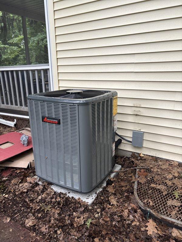 Completed full air conditioning system replacement including outdoor condensing unit and indoor air handler components. Installed new Amana condensing unit on existing concrete pad with proper electrical disconnect and refrigerant line connections. Replaced indoor air handler in basement mechanical room with new ductwork connections and condensate drainage system. Verified proper system operation, refrigerant charge, and airflow upon startup.