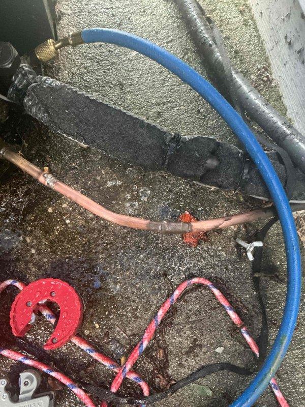# CP-Cooling Problem Resolution

Responded to service call for 5-year-old EVCON system with condenser unit running but delivering inadequate cooling despite recent filter replacement. Upon arrival, performed comprehensive system diagnostics to identify root cause of cooling deficiency.

Inspection revealed refrigerant line issues requiring immediate attention. Evaluated copper refrigerant lines and connections for proper integrity and insulation. Found compromised line set components affecting system performance. Proceeded with refrigerant line service work, utilizing specialized tube bending and fitting tools to address the deficiencies.

Replaced deteriorated line insulation on suction line, which had degraded significantly and was no longer providing adequate temperature protection. This deterioration was contributing to efficiency loss and reduced cooling capacity. Installed new foam insulation on refrigerant lines to restore proper thermal protection and prevent condensation issue
