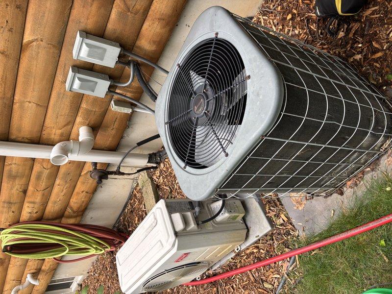 Completed comprehensive AC Super Tune-up on 15-year-old residential cooling system. Performed full system inspection of outdoor condenser unit, verified proper airflow through coil assembly, checked refrigerant levels, tested electrical connections and capacitor function, cleaned condenser coils, and confirmed proper drainage from condensate line. All components operating within manufacturer specifications with no issues identified at time of service.