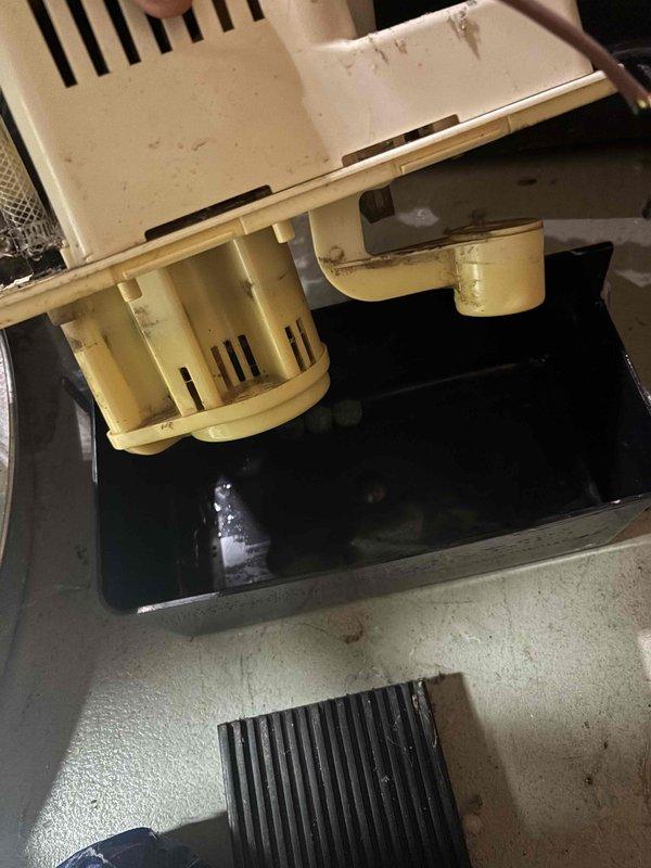 Completed annual cooling maintenance inspection on 2017 air conditioning system. Performed comprehensive tune-up including inspection of dual blower motor assembly, verified proper operation of condensate drain pan with active drainage present, and confirmed exterior refrigerant line penetration through building envelope with adequate foam sealant protection. All components operating within normal parameters with typical wear for equipment age.
