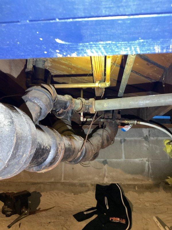 Conducted comprehensive plumbing project estimate for complete re-pipe of residential property. Performed detailed inspection of crawl space and basement areas, documenting existing plumbing infrastructure including aged PVC drain lines, corroded metal piping, and deteriorating insulation on water supply lines. Assessed structural access points through floor joists and evaluated current plumbing configuration to determine scope of copper water line replacement throughout the dwelling. Photographed all relevant plumbing components, connection points, and accessibility challenges to provide accurate material and labor projections for the proposed re-piping project.