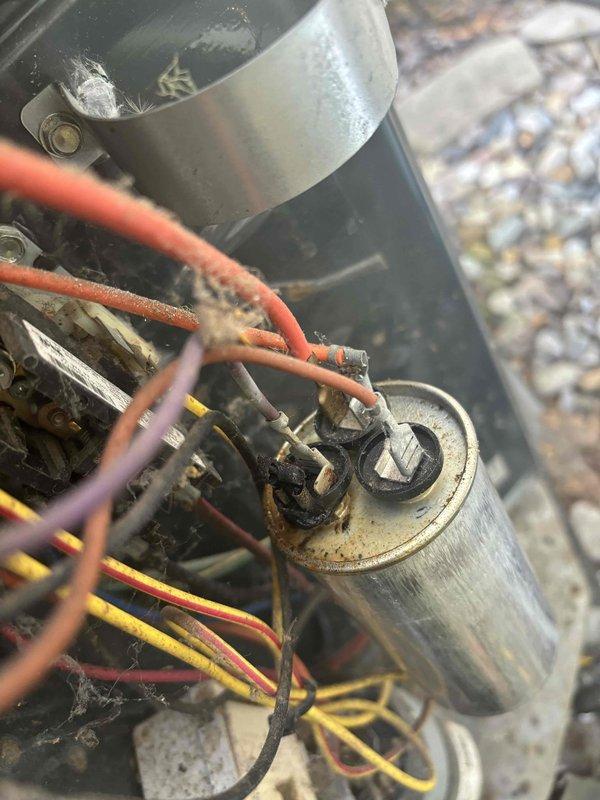 Completed annual cooling maintenance on 15-year-old AC system. Performed comprehensive inspection of outdoor condensing unit, including electrical connections, capacitor (marked for replacement in 2026), compressor, and refrigerant lines. All wiring connections were verified secure, capacitor tested within acceptable range, and condenser coil inspected. Unit is operating properly with no immediate repairs required at this time.