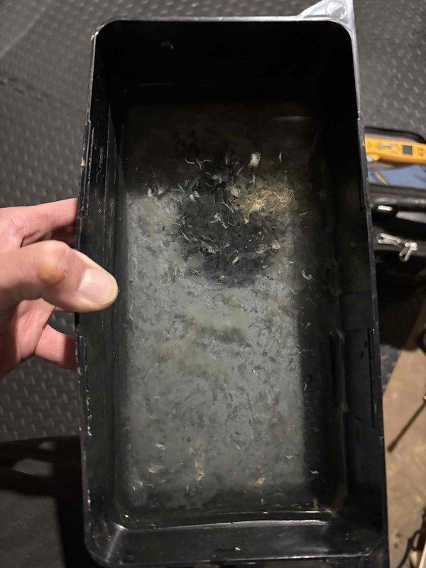 Completed annual cooling maintenance on ICP system. During inspection, discovered severely deteriorated condensate drain pan with extensive corrosion, cracking, and compromised structural integrity. Pan exhibited heavy scale buildup, debris accumulation, and complete coating failure exposing underlying metal substrate. Documented damage with photos and recommended immediate drain pan replacement to prevent water damage and system failure.