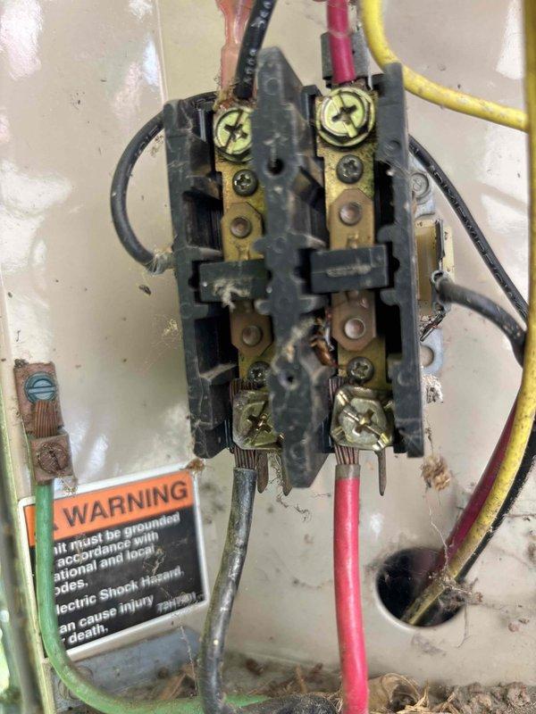 Responded to no cooling complaint on 29-year-old Lennox air conditioning system. Upon inspection, found severely oxidized and deteriorated contactor with compromised electrical connections at the outdoor condensing unit. Contactor terminals showed extensive tarnishing and heat damage, preventing proper compressor operation. Replaced failed contactor assembly and verified all electrical connections were secure. Tested system operation and confirmed compressor engagement, proper amperage draw, and adequate cooling air discharge at supply registers. Unit restored to normal cooling operation.