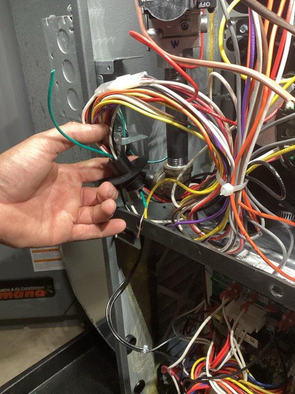Continued HVAC electrical repairs on quoted system. Performed low-voltage and line-voltage wiring connections, including proper termination of control wiring and power supply conductors. Installed and secured multicolored wire bundles with appropriate fasteners, connected contactor/relay components, and verified proper wire routing through equipment housing to ensure safe and code-compliant operation.