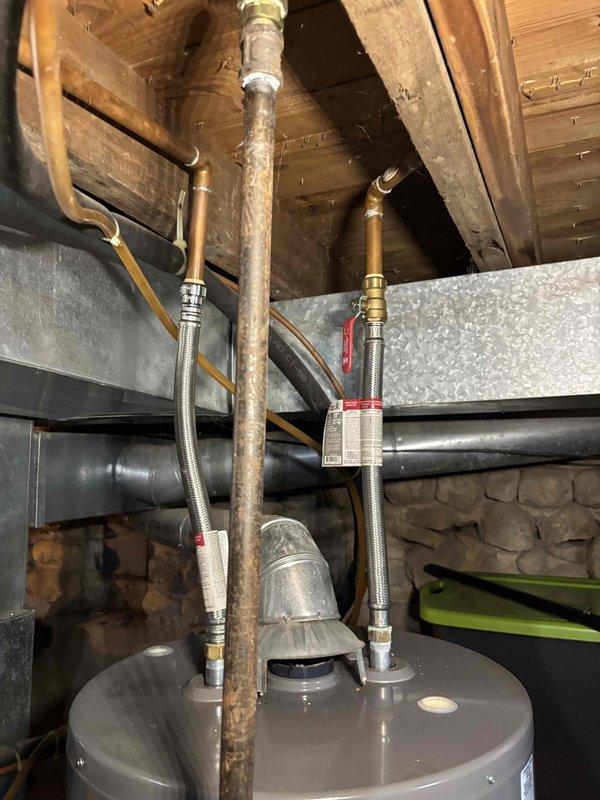 # Frozen Compressor Service Call

Responded to service call for 16-year-old residential air conditioning system with reported frozen and iced-up compressor. Upon arrival, performed visual inspection of outdoor condenser unit and associated components.

## Findings

Found outdoor condenser unit with significant ice accumulation on refrigerant lines and compressor assembly. Unit located on concrete pad with proper clearances maintained. Electrical connections and conduit in acceptable condition. Observed system had been operating under restricted airflow or low refrigerant charge conditions leading to freeze-up.

## Actions Taken

- Shut down system to allow complete ice melt from evaporator coil and refrigerant lines
- Inspected condenser coil fins for debris obstruction and proper airflow
- Examined refrigerant line insulation for deterioration
- Checked condensate drain system for proper operation
- Documented equipment condition with photographs for service records
- Inspected indoor
