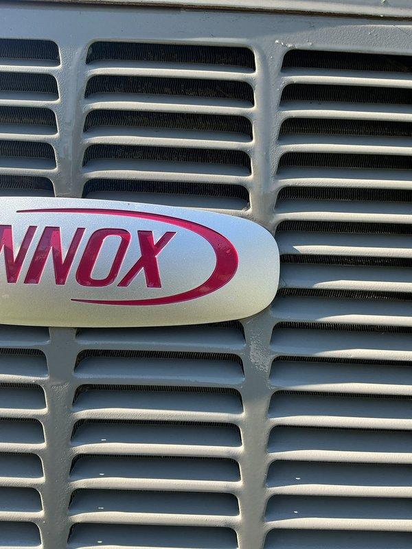 Completed annual cooling maintenance on 9-year-old Lennox air conditioning system. Performed comprehensive tune-up including electrical diagnostics with digital multimeter, inspected compressor assembly and capacitor, verified proper electrical connections at terminal blocks, and assessed overall unit operation. All components functioning within normal parameters; system ready for cooling season.