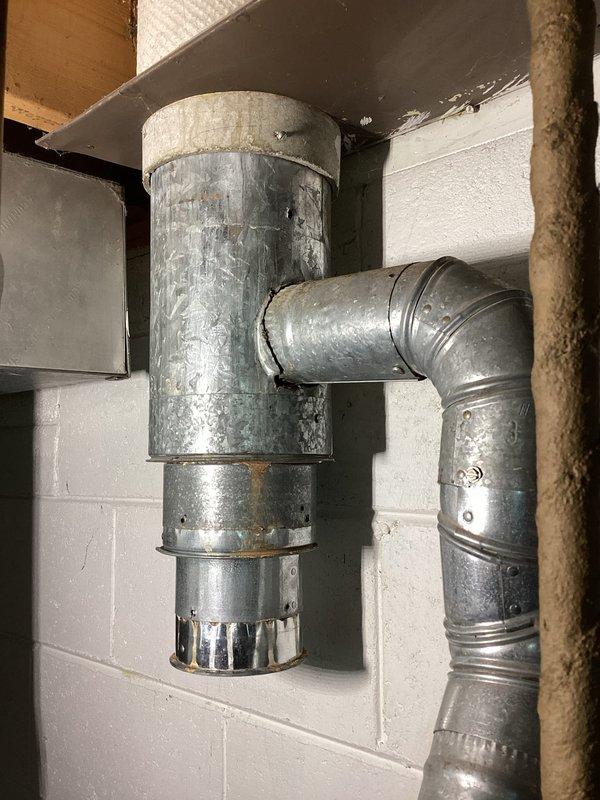 Successfully installed a Bradford White 40-gallon tall natural draft water heater in basement utility area. Connected all supply and discharge plumbing lines with copper piping, installed proper draft hood and venting through existing flue system, and verified all connections for proper operation. Blue isolation valve installed on cold water supply line, and unit tested to ensure safe and efficient operation per manufacturer specifications.