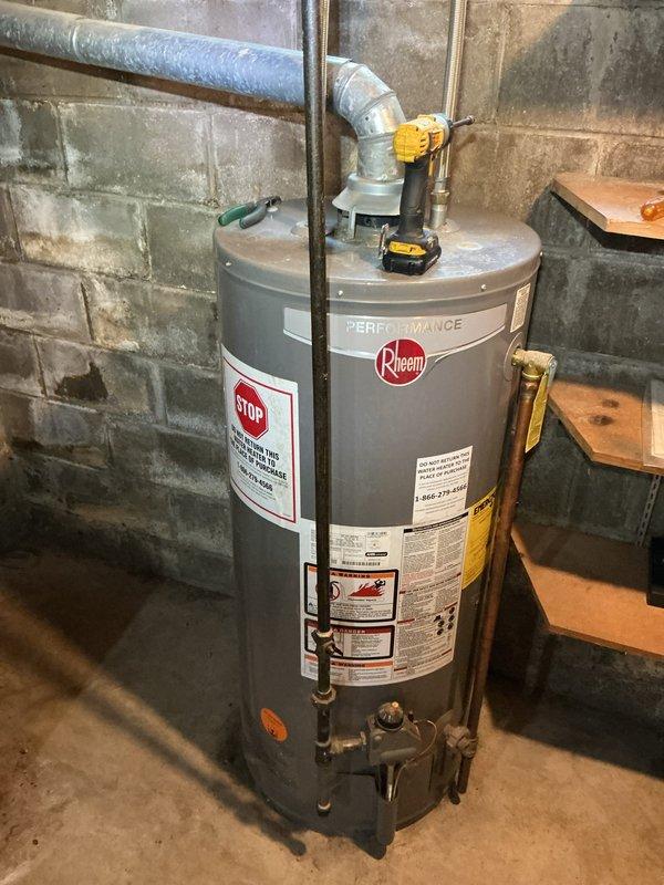 Completed annual cooling maintenance on 30-year-old York air conditioning system. Performed comprehensive tune-up including inspection of all major components, electrical connections, and system operation. Evaluated refrigerant charge per customer request from previous service recommendation; assessed system pressures and temperatures. Documented equipment condition with photos of furnace and mechanical room setup. System operational at time of departure.