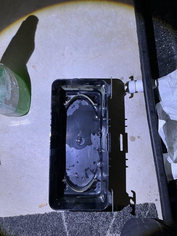 Completed annual cooling maintenance on 12-year-old Carrier air conditioning system. Performed standard tune-up procedures including inspection of condenser unit, cleaning of drain pan which showed accumulated debris and moisture, and verification of system operation. All components functioning properly at time of service completion.