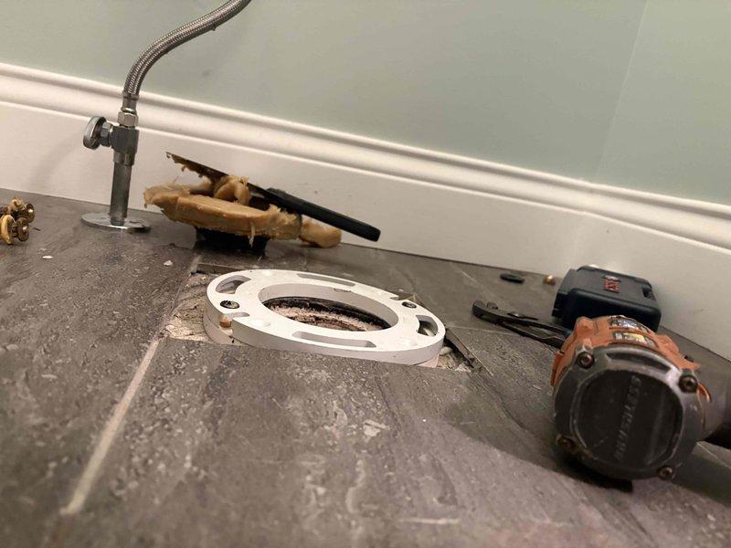 Completed toilet replacement due to cracked tank. Removed existing fixture, prepared flange and floor surface, and installed new two-piece white ceramic toilet with proper wax ring seal and secure mounting. Verified proper operation and left bathroom clean and functional.
