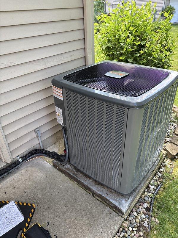 Responded to warranty call for ALXS5BA48 air conditioning condenser unit and CAPTA6030C3 air handler system. Performed complete system inspection of outdoor condenser unit positioned on concrete pad and indoor HVAC equipment installation, verified proper operation of all components, checked refrigerant lines and electrical connections, and documented equipment condition with photographs for warranty documentation purposes.