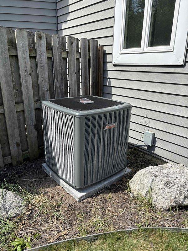 Successfully completed full air conditioning system replacement at residential property. Removed existing AC unit and installed new Daikin comfort system, including outdoor condenser unit positioned on concrete pad at corner of structure and interior air handling components. Completed all electrical connections, refrigerant line installations, and ductwork connections per manufacturer specifications. Verified proper system operation, airflow, and temperature differentials. All safety labels and documentation affixed to equipment interior per code requirements.