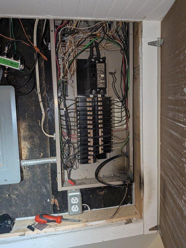 Performed no-charge return visit to provide second opinion on furnace and air conditioning system following lightning strike damage to furnace. Conducted thorough inspection and documentation of electrical panel installation, capturing detailed photographs of dual circuit breaker panels, main disconnect, wiring configurations, and overall electrical infrastructure condition for technical consultation. Photos collected for review and determination of next steps regarding electrical system assessment and repair recommendations.