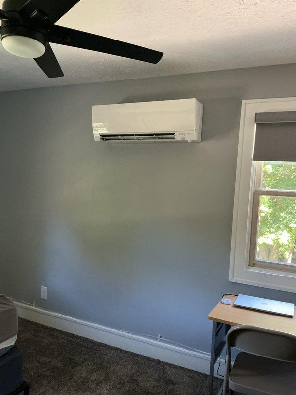 Responded to service call for musty odor complaint on Mitsubishi mini split system with two indoor head units. Performed thorough cleaning and maintenance service on both wall-mounted air handlers to remove mold and mildew buildup from evaporator coils, blower wheels, and drain pans. Inspected outdoor condenser unit, verified proper drainage, and confirmed system operation on both zones to ensure optimal performance and air quality.