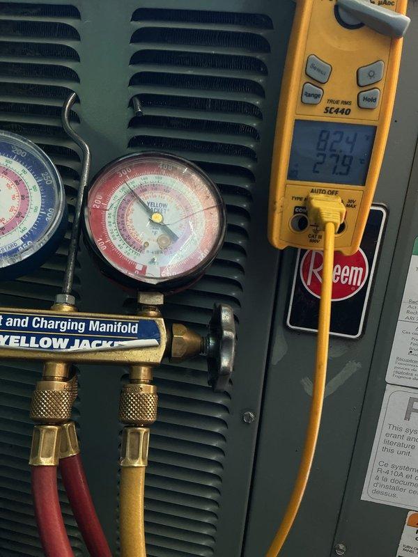 Responded to callback for refrigerant recharge on 16-year-old Rheem air conditioning system following earlier leak repair service. Upon arrival, connected manifold gauge set and verified system pressures were low due to previous refrigerant loss. Utilized refrigerant recovery equipment with digital scale to accurately measure and charge system to manufacturer specifications. Monitored system pressures using Yellow Jacket manifold gauges and digital multimeter to verify proper superheat and subcooling temperatures during charging process. System tested and confirmed operating within normal parameters with adequate refrigerant levels restored.