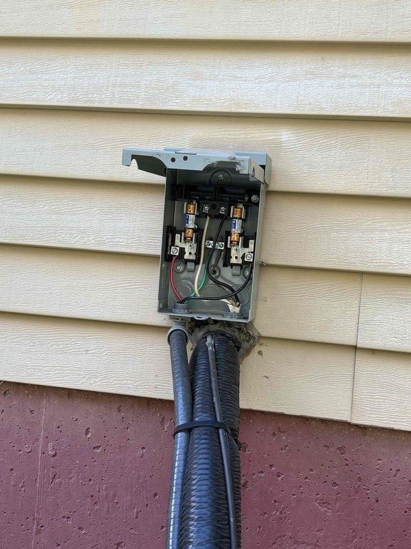 Responded to no cooling complaint at duplex residence. Upon arrival, performed electrical diagnostics at outdoor condensing unit. Found blown fuses in outdoor disconnect, preventing compressor operation. Replaced failed fuses and verified proper voltage and amperage draw using clamp meter. Confirmed outdoor unit restored to normal operation with appropriate electrical readings. System returned to cooling mode successfully.