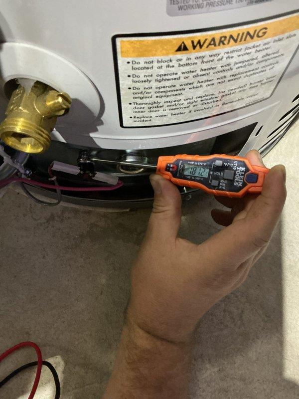 Responded to service call for pilot light not staying lit on water heater. Upon arrival, inspected burner assembly and thermocouple connection. Used multimeter to test thermocouple voltage output, which indicated insufficient millivoltage to maintain gas valve engagement. Cleaned pilot assembly and burner orifice of debris and sediment buildup visible in combustion chamber. Verified proper flame characteristics and thermocouple positioning in pilot flame. Unit restored to normal operation with pilot remaining lit and burner cycling properly.