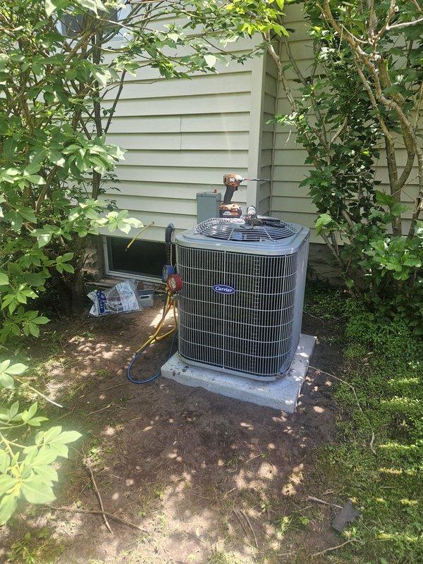 Completed full add-on air conditioning system installation to existing forced-air heating system. Installed new Carrier outdoor condensing unit on concrete pad with proper clearances and electrical disconnect. Ran refrigerant lines and established connections to new evaporator coil integrated with existing furnace system. Installed all necessary ductwork modifications, drainage piping, and PVC condensate lines. System tested, charged to manufacturer specifications, and verified operational with proper airflow and temperature differentials across coil.