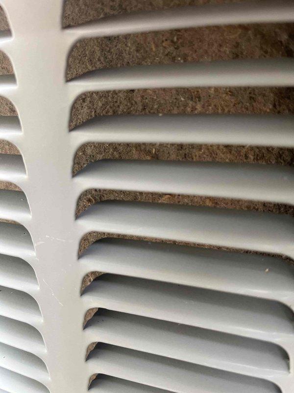 Completed annual cooling maintenance on 6-year-old EnergiAir outdoor condensing unit with warranty through July 2029. Performed comprehensive tune-up including inspection of exterior cabinet condition, verification of proper airflow through louvered panels, and documentation of system operating on concrete pad with adequate clearance. Unit found in good operating condition with clean exterior finish and properly secured top cover.