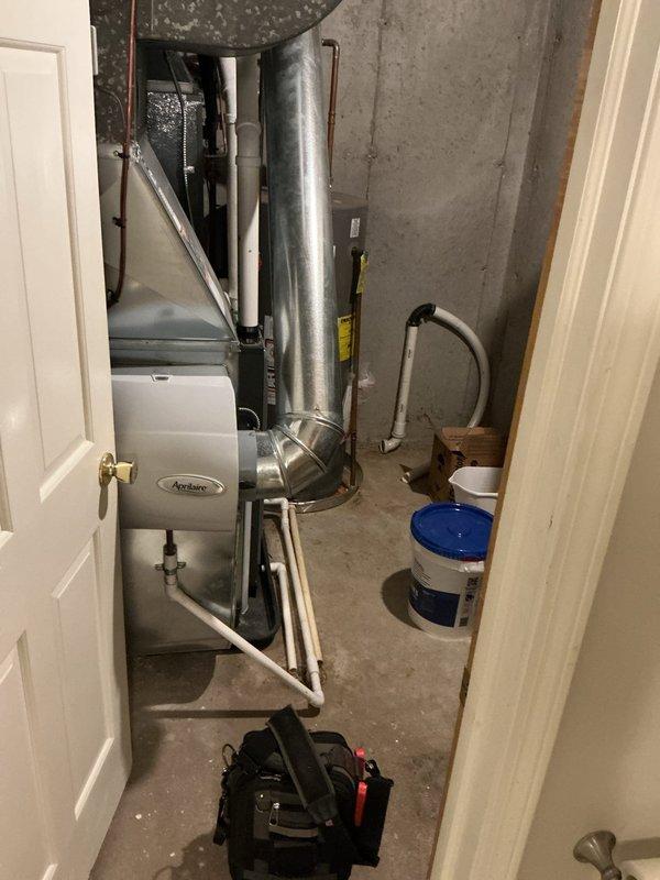 Completed annual cooling maintenance on residential air conditioning system under active maintenance agreement. Performed comprehensive tune-up including inspection of indoor air handler unit with Aprilaire humidification system and outdoor condenser unit. Checked refrigerant pressures and system operation, cleaned condenser coils, verified electrical connections at disconnect box, and tested overall system performance. Unit operating within normal parameters. All maintenance tasks completed successfully with no issues identified requiring immediate attention.