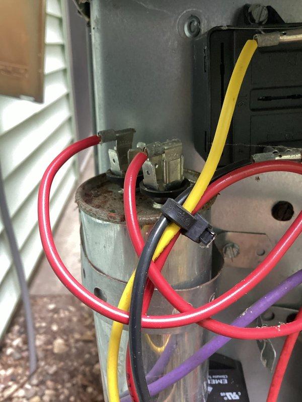 Completed annual cooling maintenance on 11-year-old EnergiAir system. Performed standard tune-up procedures including system inspection, cleaning, and operational testing. Documented existing capacitor showing significant rust and corrosion on exterior housing, though unit remained functional at time of service. Noted weathered electrical components and outdoor-mounted equipment displaying age-appropriate wear. All electrical connections verified secure, system operating within normal parameters upon completion of maintenance visit.