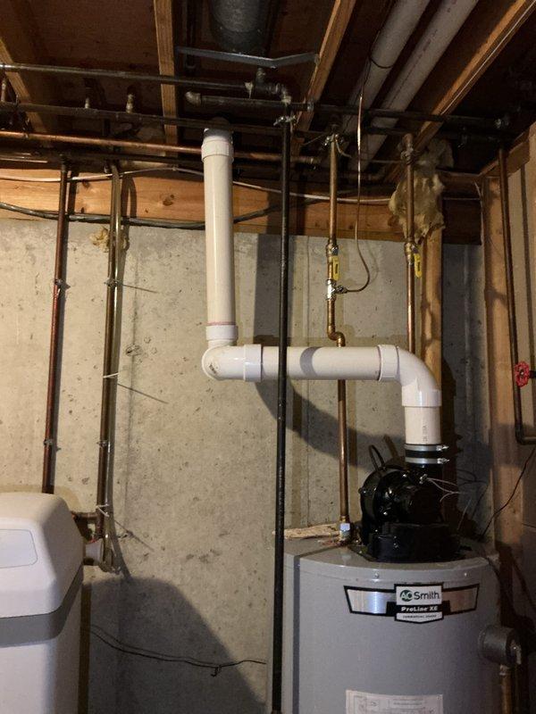Responded to gas leak complaint with reported rotten egg odor near back door exterior. Performed comprehensive leak detection survey of gas piping system, with particular attention to areas where piping was previously rerouted in April. Inspected all accessible gas lines, connections, and fittings throughout basement utility area including furnace supply lines and water heater connections. Utilized combustible gas detector to identify leak source at compromised fitting on gas line. Isolated affected section, tightened connection, and performed soap bubble test to verify repair integrity. Conducted final system pressure test and confirmed all gas appliances operating safely with no detectable leaks present. Documented equipment conditions and piping configurations with photographs for service records.