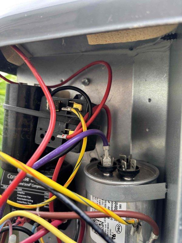 Completed annual cooling maintenance on EnergiAir system under 2-year warranty coverage. Performed comprehensive AC tune-up including inspection of electrical components, capacitor, compressor with CoreSense diagnostics module, and refrigerant lines. All wiring connections, control modules, and mechanical components inspected and found to be operating within normal parameters with no immediate service needs identified.